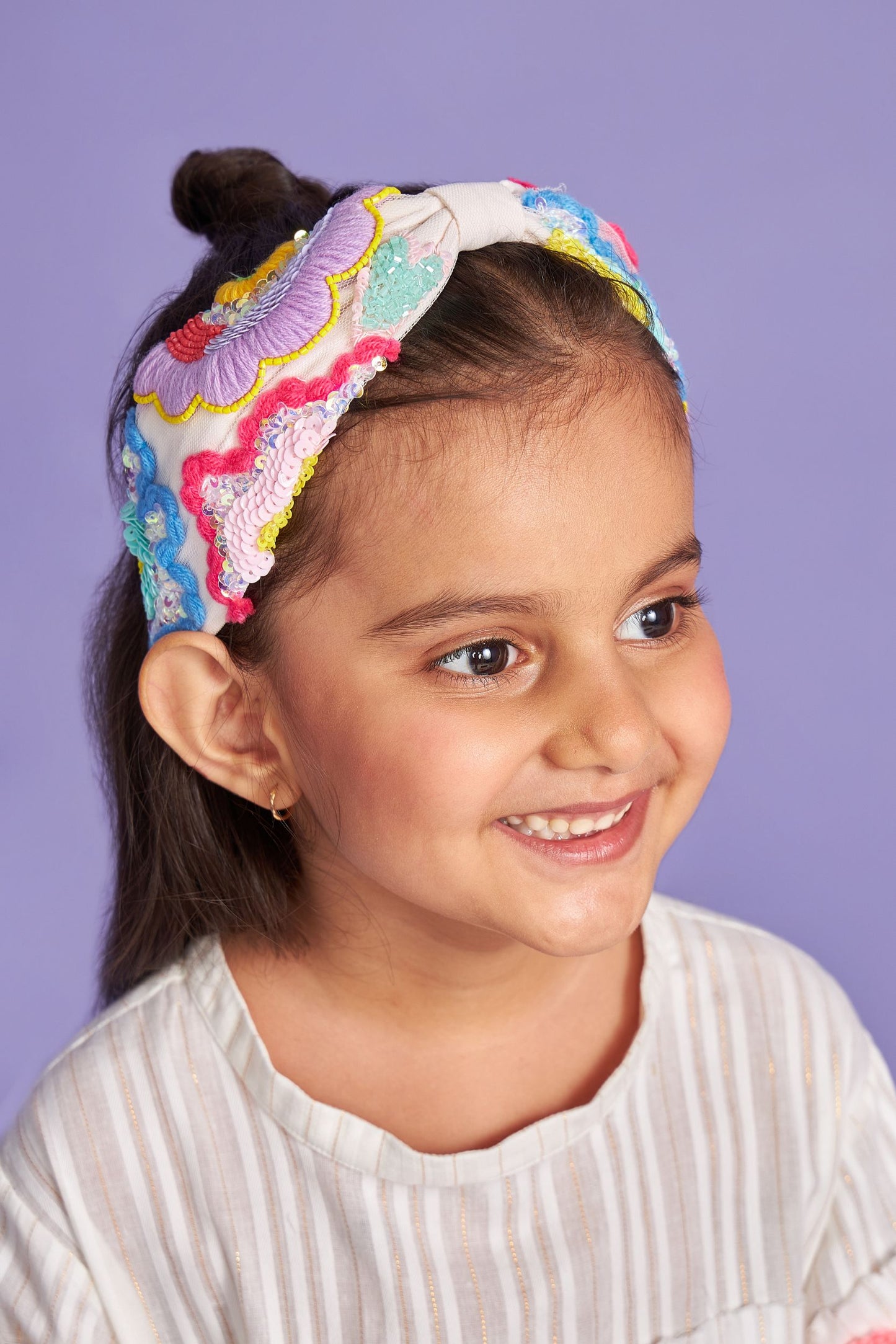 Cara embroidered headband on kids